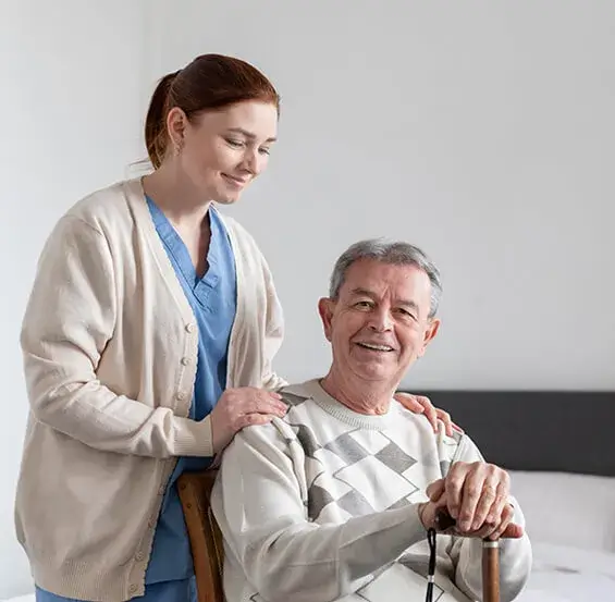 A woman standing next to an older man.