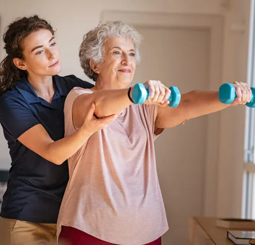 A woman and an older person are doing exercises.